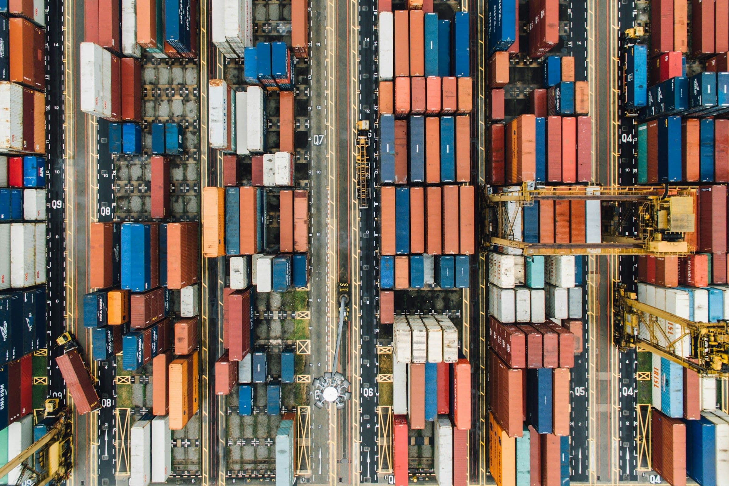 Aerial view of shipping containers organized at an international port